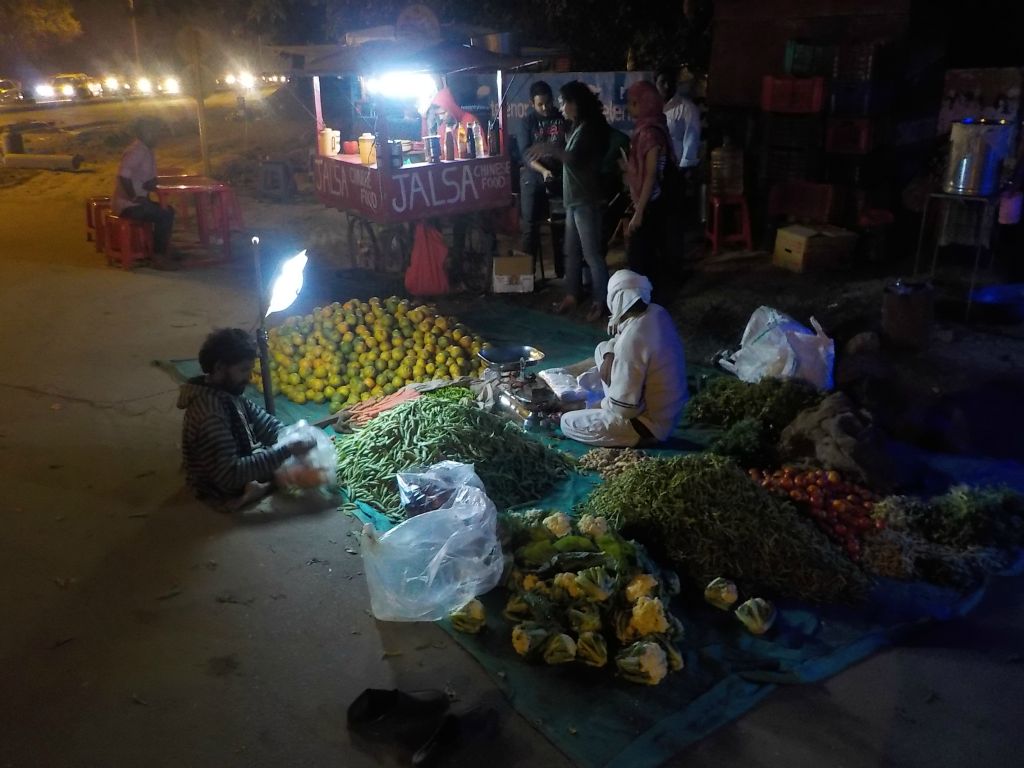Some pictures taken after sundown. Stalls along a street