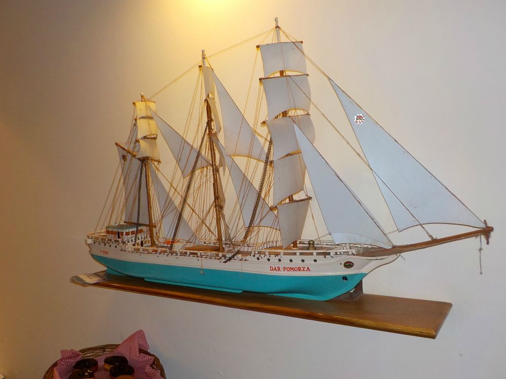 "Dar Pomorza" (it is a Polish full-rigged sailing ship built in 1909 which is preserved in Gdynia, Poland as a museum ship). Unfortunately I have no idea who, when and why put this ship in the hotel's restaurant.