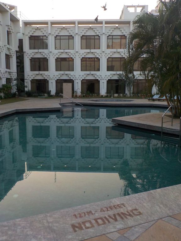 A hotel's swimming pool. In this hotel it is at the courtyard. 